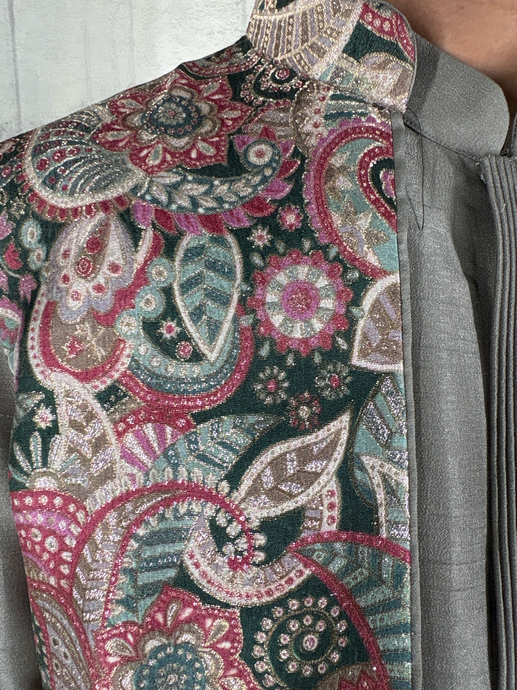 Green coloured plain kurta set with printed colourful bundi