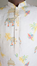 Cream kurta top with elephant print motifs