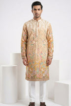 Cream colour kurta top with floral and architectural design embroidery