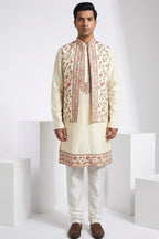 Gold colour kurta top with colourful thread work bundi