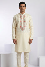 Gold colour kurta top with colourful thread work bundi