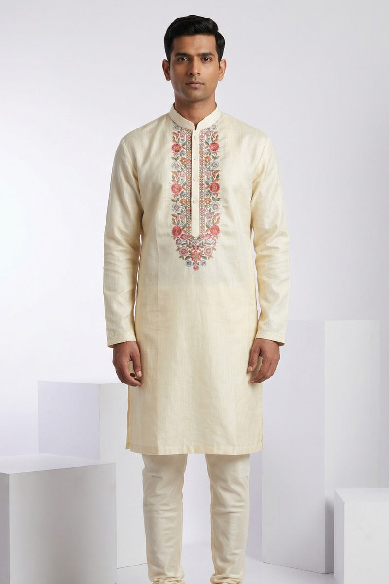 Gold colour kurta top with colourful thread work bundi