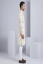 Cream kurta top with elephant print motifs