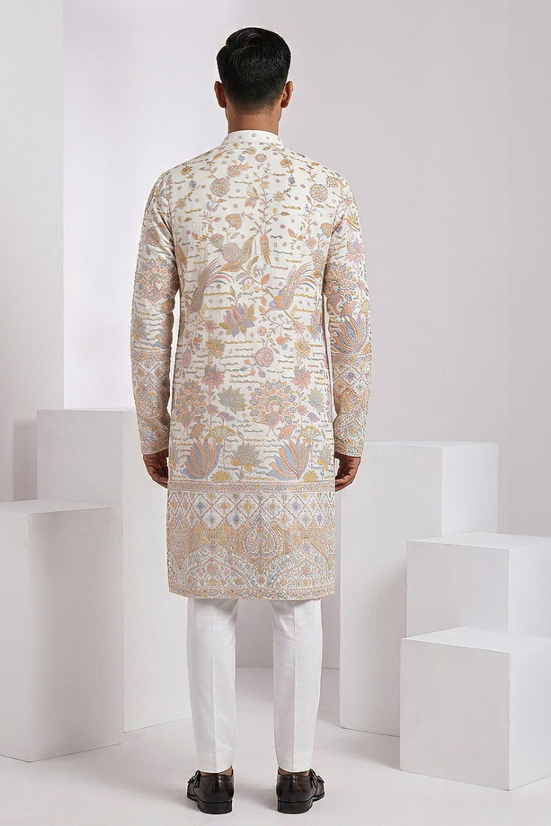 White colour kurta top with allover thread work and embroidery