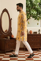 Yellow printed cotton blend kurta set with a half zipper