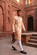 Cream colour kurta with allover floral printed design with pant