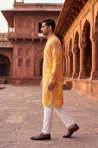 Yellow and brown printed kurta top with embroidered neck and pant