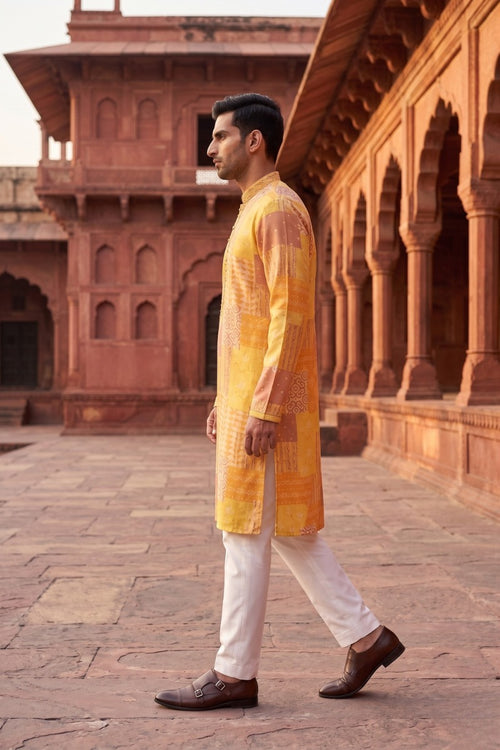 Yellow and brown printed kurta top with embroidered neck and pant