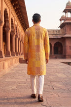 Yellow and brown printed kurta top with embroidered neck and pant
