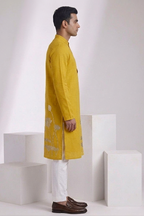 Yellow colour kurta top with sleeves with lotus and hummingbird details