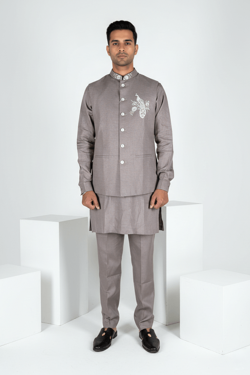 Grey plain kurta set with detailed hand embroidery of a peacock and minimal neck work bundi