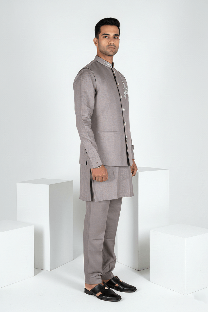 Grey plain kurta set with detailed hand embroidery of a peacock and minimal neck work bundi