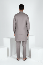 Grey plain kurta set with detailed hand embroidery of a peacock and minimal neck work bundi